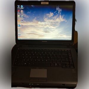 Toshiba Satellite L300D Laptop – Working, Charger Included
